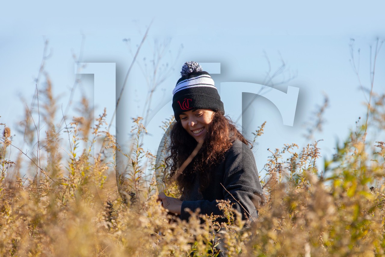 A UC Undergrad Botany student conducts field research